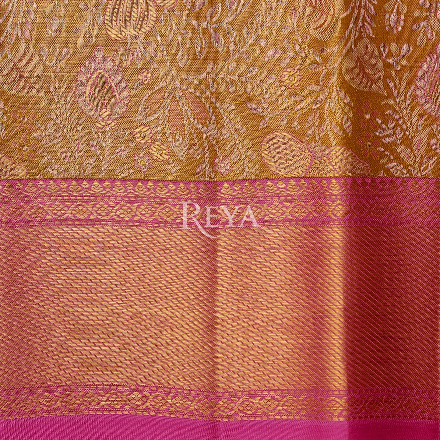 'Golden Hour of Madurai Kanjeevaram' in golden yellow and temple pink