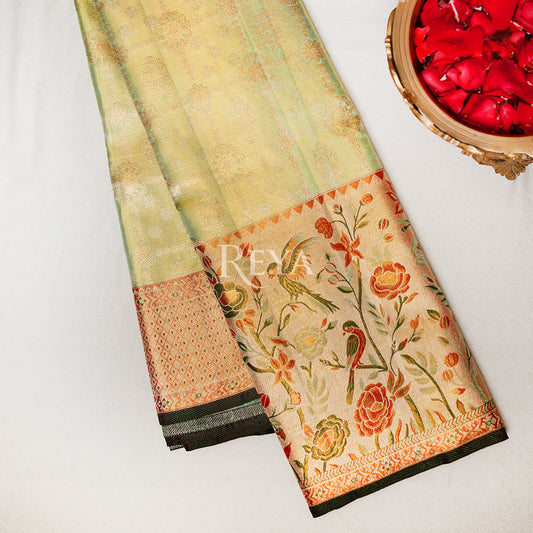 'Song of the Silk Garden Kanjeevaram' in pistachio green and meenakari hues