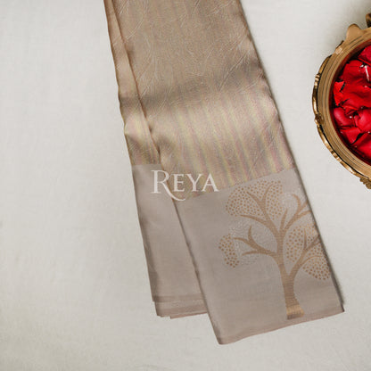 'Ivory Canopy Kanjeevaram' with woven tree motifs and shimmer