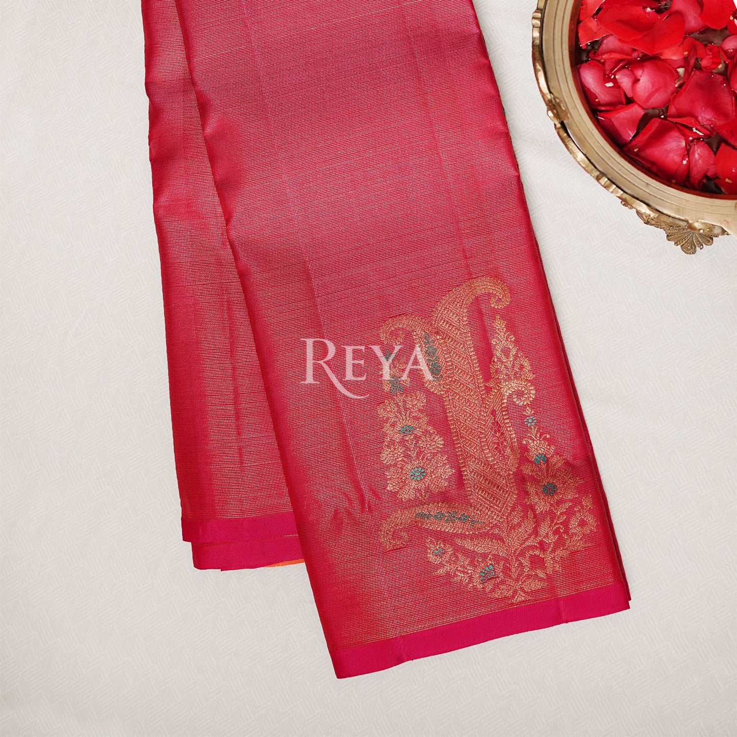 Radiant Ruby Kanjeevaram' in pink and gold zari florals