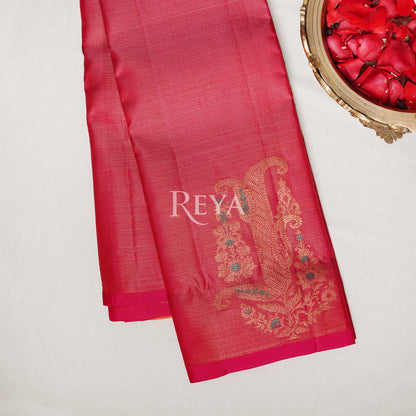 Radiant Ruby Kanjeevaram' in pink and gold zari florals