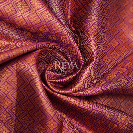 'Majesty of Kanjeevaram' in regal plum and heirloom gold
