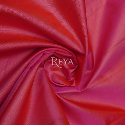 Radiant Ruby Kanjeevaram' in pink and gold zari florals