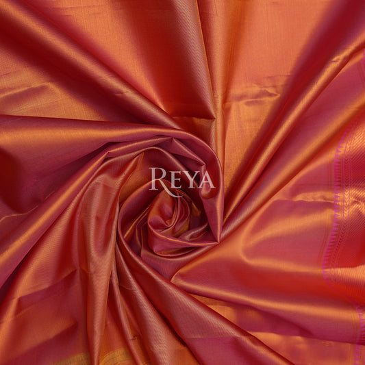 'Golden Hour of Madurai Kanjeevaram' in golden yellow and temple pink