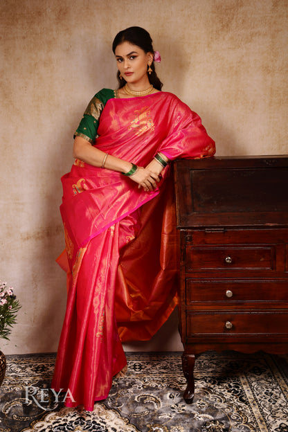 Radiant Ruby Kanjeevaram' in pink and gold zari florals