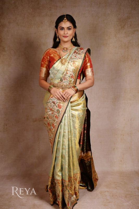 'Song of the Silk Garden Kanjeevaram' in pistachio green and meenakari hues