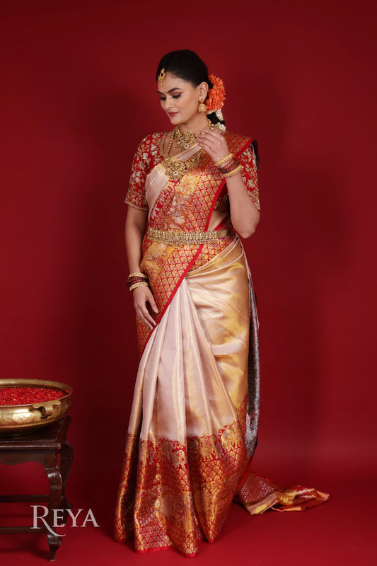 'Royal Elephant Parade  Kanjeevaram' in temple red and  rose gold