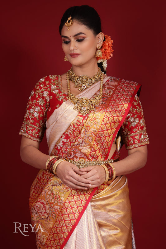 'Royal Elephant Parade  Kanjeevaram' in temple red and  rose gold