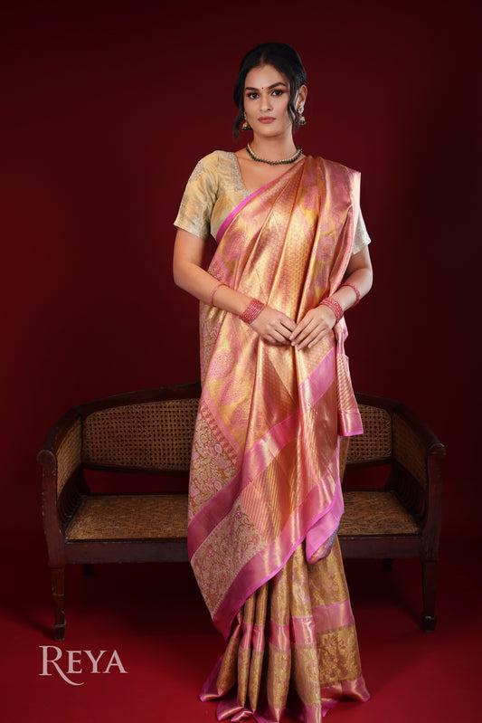 'Golden Hour of Madurai Kanjeevaram' in golden yellow and temple pink