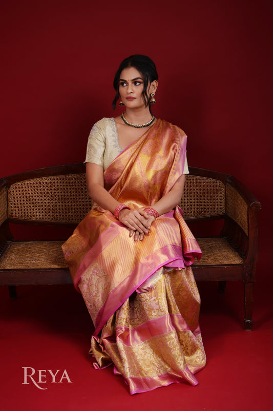 'Golden Hour of Madurai Kanjeevaram' in golden yellow and temple pink