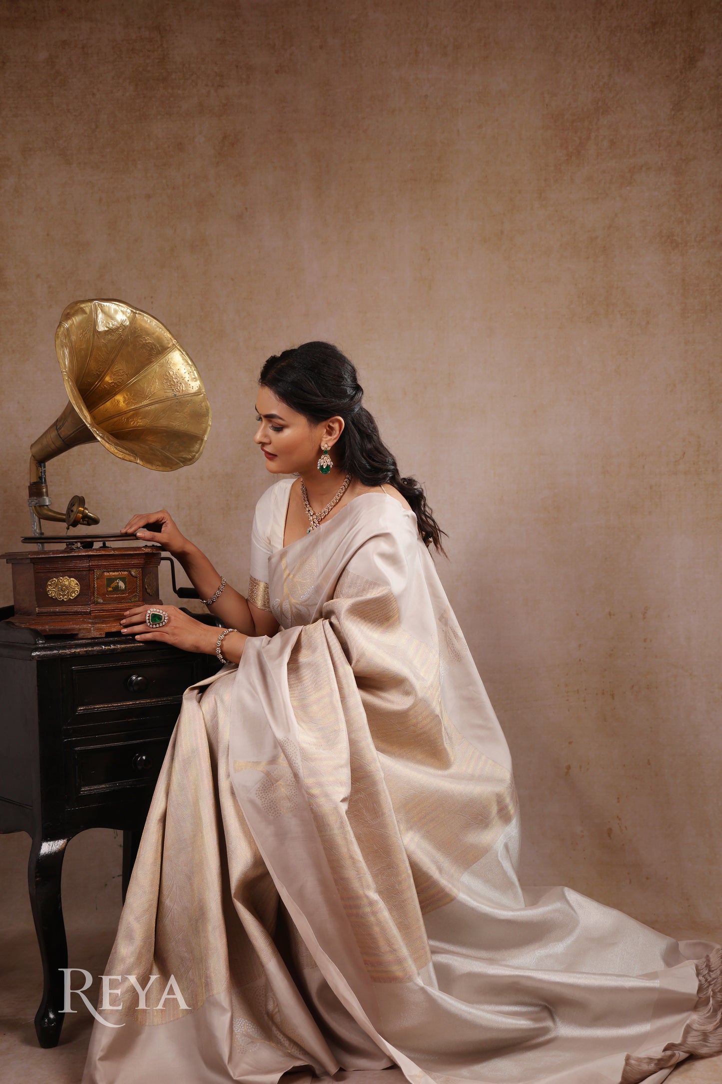 'Ivory Canopy Kanjeevaram' with woven tree motifs and shimmer