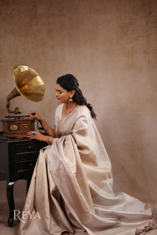 'Ivory Canopy Kanjeevaram' with woven tree motifs and shimmer