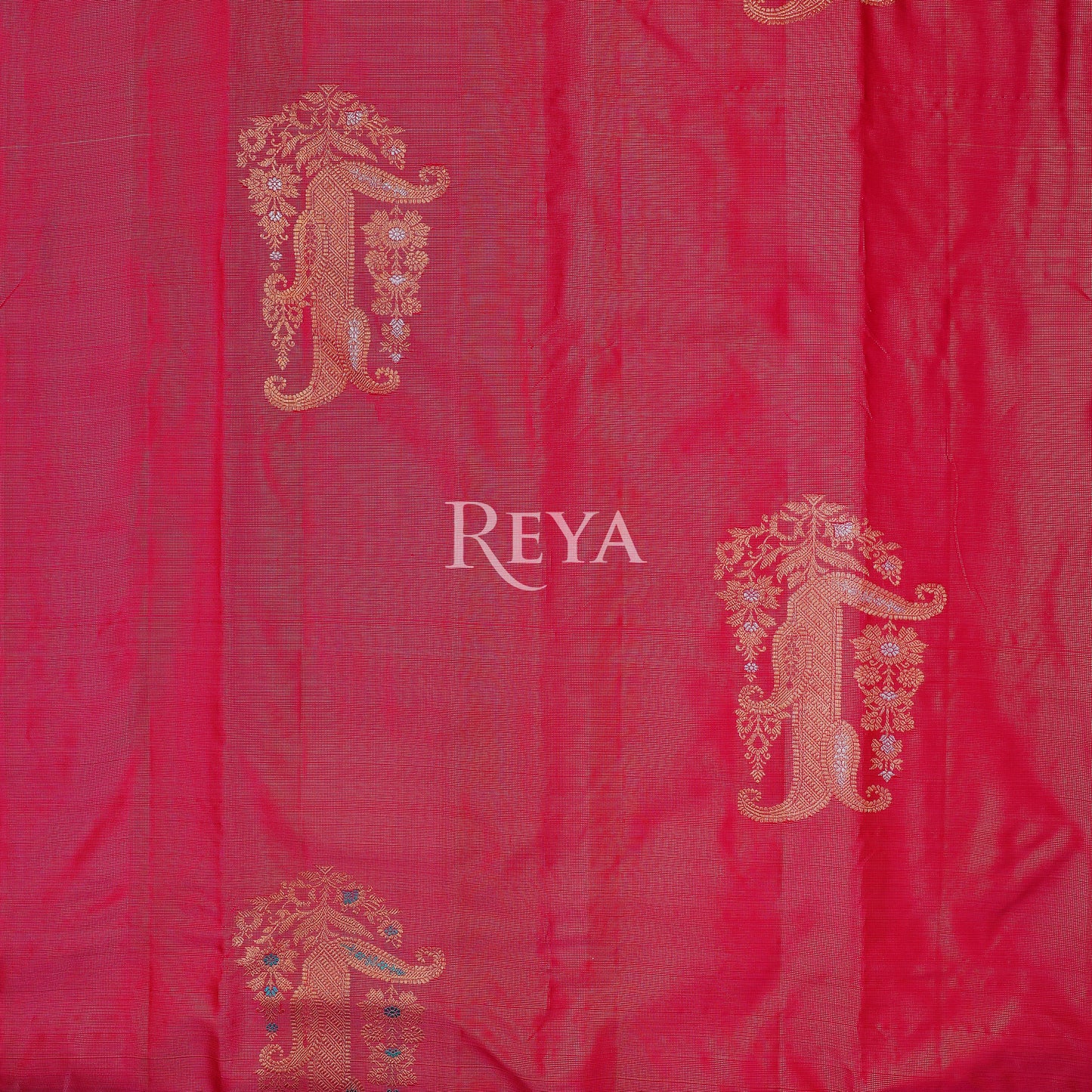 Radiant Ruby Kanjeevaram' in pink and gold zari florals