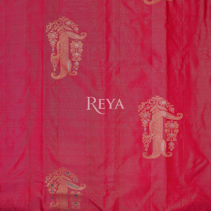 Radiant Ruby Kanjeevaram' in pink and gold zari florals