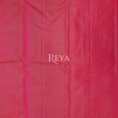 Radiant Ruby Kanjeevaram' in pink and gold zari florals