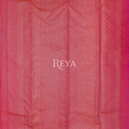 Radiant Ruby Kanjeevaram' in pink and gold zari florals